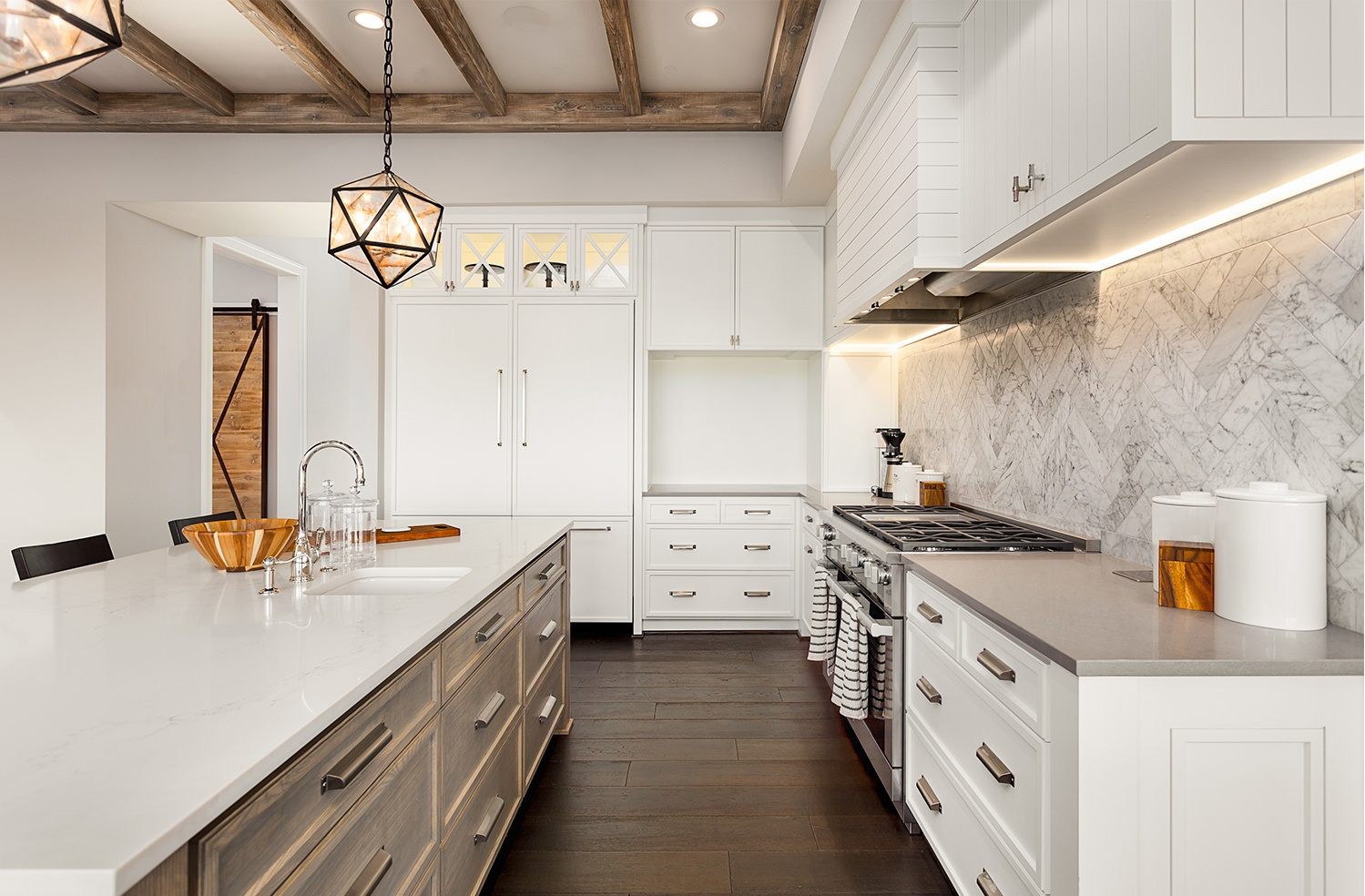 Large white kitchen with custom cabinets in Portland, OR