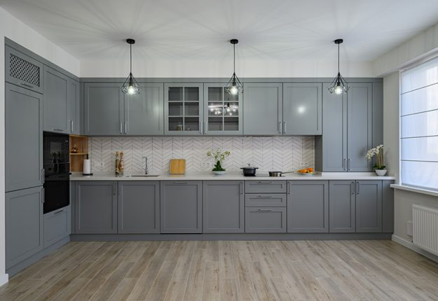 large-renovated-kitchen-with-gray-cabinetry A large renovated kitchen with gray cabinetry